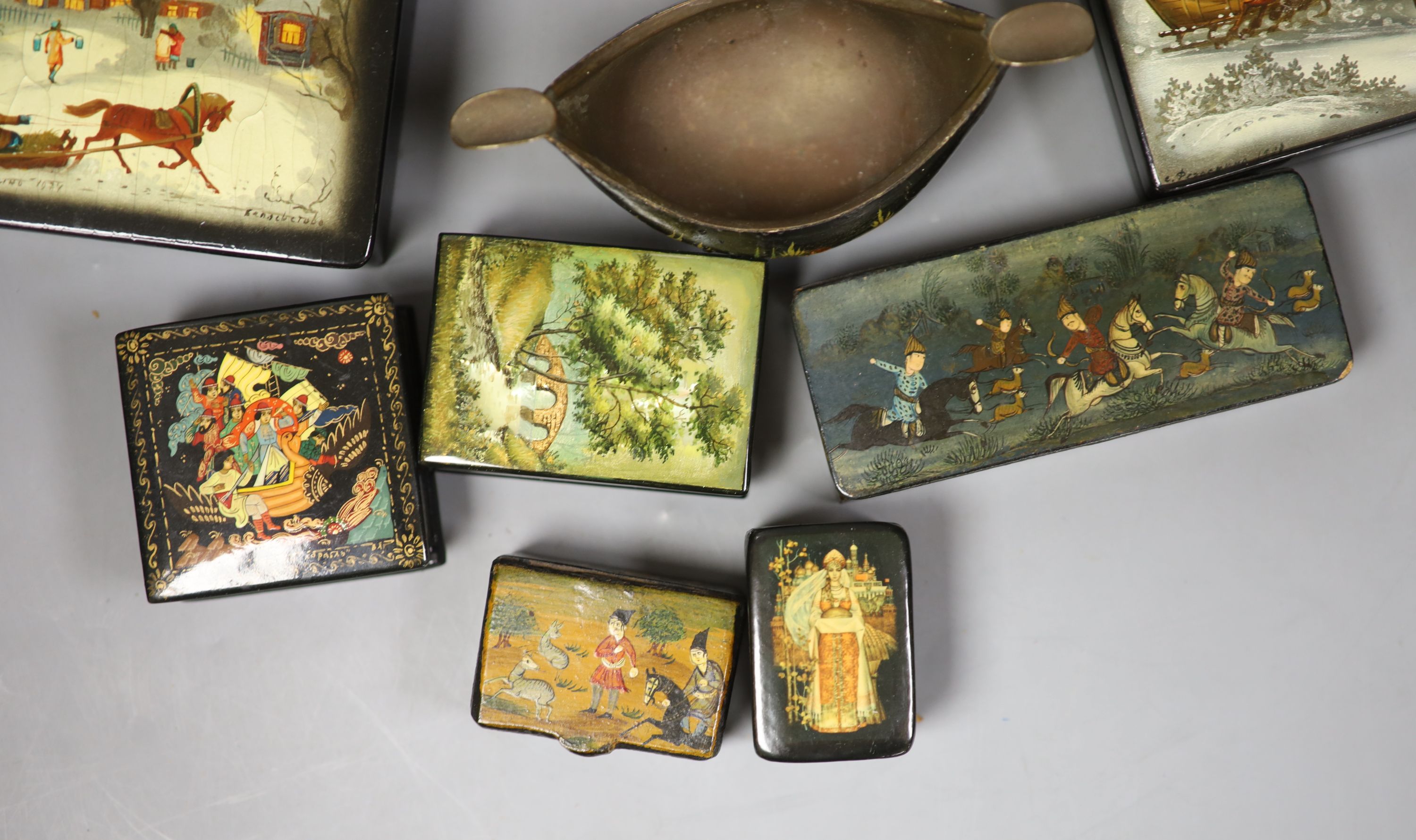 Twelve Russian or Persian Papier mache boxes